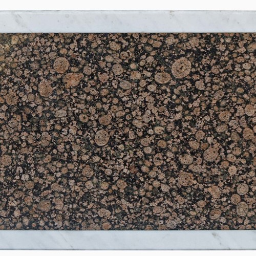 A Reclaimed Marble And Granite Table Top