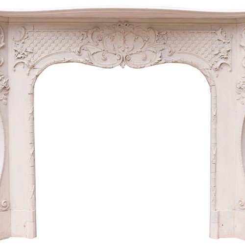 An Antique Rococo Style Fire Surround