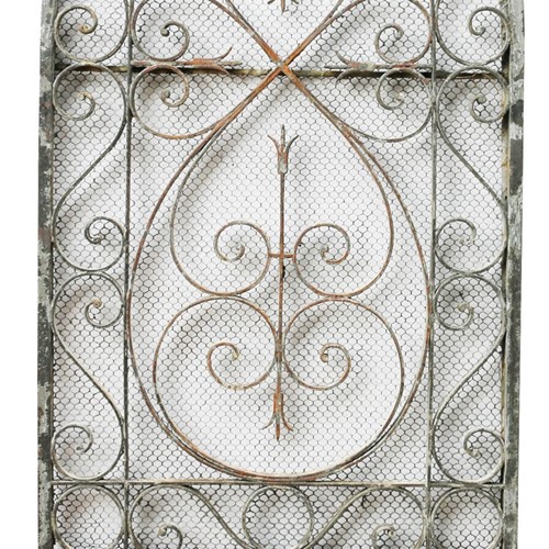 An Antique Wrought Iron Arched Side Gate