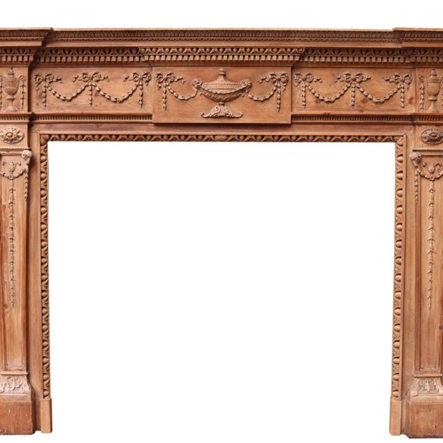A Georgian Style Carved Pine Fire Surround