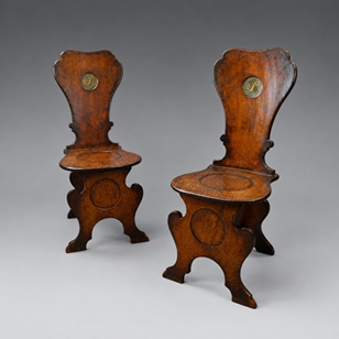 A Pair Of Sgabello Hall Chairs