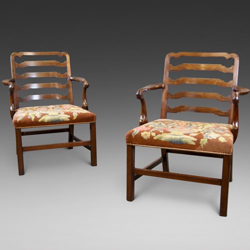 A Pair Of Chippendale Period Arm Chairs