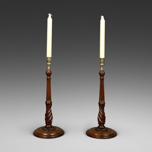 A exceptional pair of Georgian candlesticks