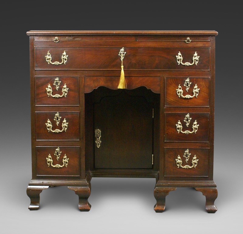 A Cuban Mahogany Knee-Hole Desk.-w-j-gravener-antiques-btrulet4-main-638086975278129200.jpeg
