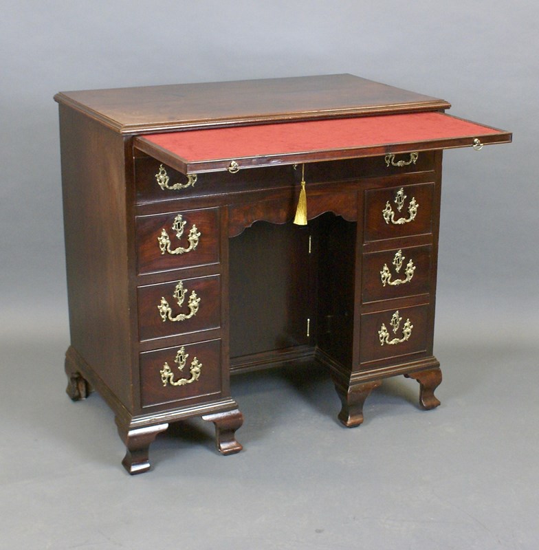 A Cuban Mahogany Knee-Hole Desk.-w-j-gravener-antiques-dsc00128-main-638086975831539001.jpg
