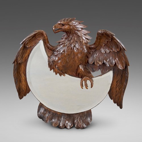 A Finely Carved Black Forest Mirror