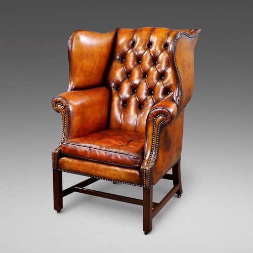 A George III Mahogany Wing Chair