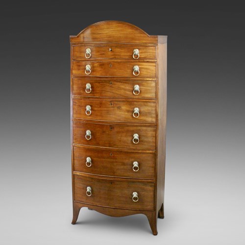 An Unusual Regency Tall Bow-Fronted Chest