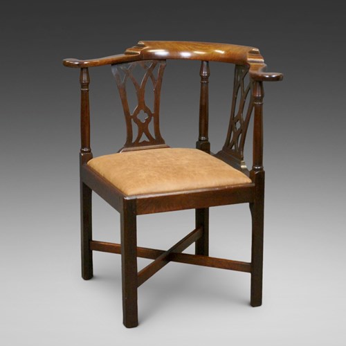 A George III Mahogany Corner Chair