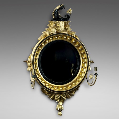 A Rare Regency Convex Gilt Wood Mirror