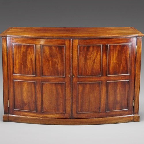 An Unusual George III Bow-Fronted Cupboard