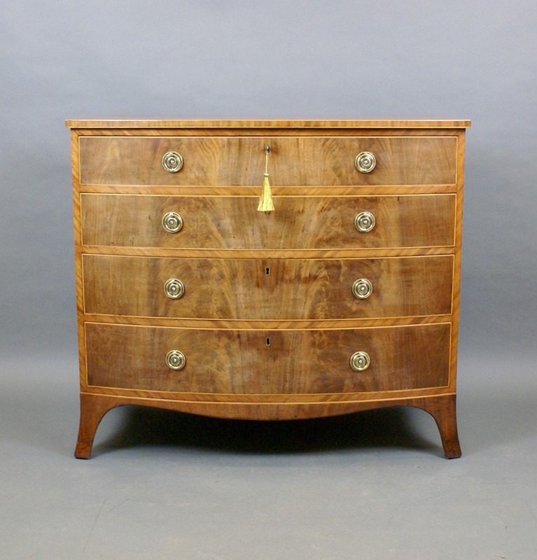 A George III Flame Mahogany Bow Fronted Chest-w-j-gravener-antiques-dsc09992-main-638047364041011284.jpg