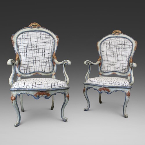 A rare pair of 18th Century Barocchetto arm chairs
