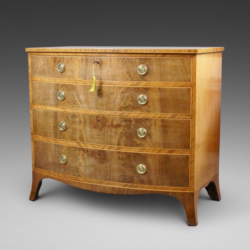 A George III Flame Mahogany Bow Fronted Chest