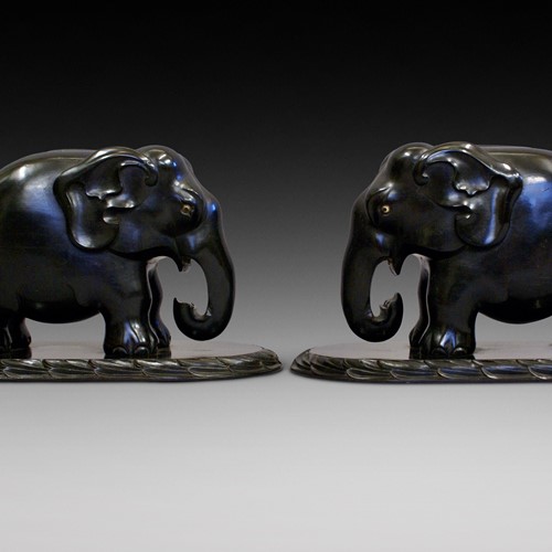 Exceptional pair of carved ebony elephants.