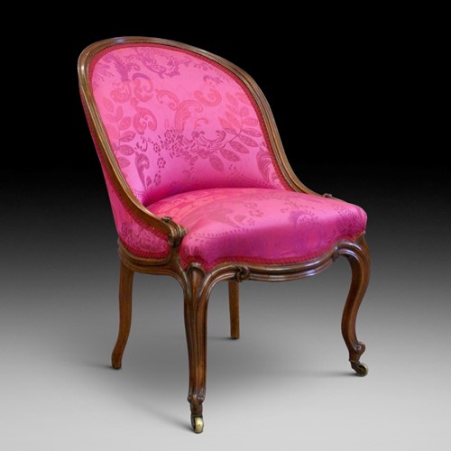A Fine Early Victorian Rosewood Slipper Chair