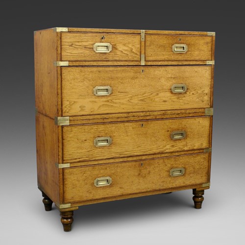 An oak military or campaign chest of drawers