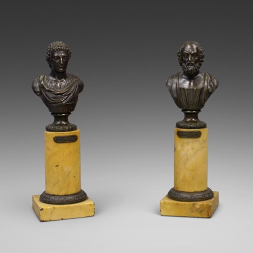 A pair of bronze busts of classical philosophers 