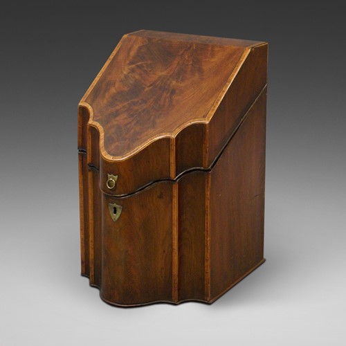 A George III flame mahogany knife box