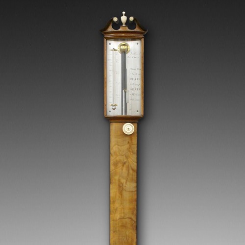 A George III mahogany bow-fronted stick barometer