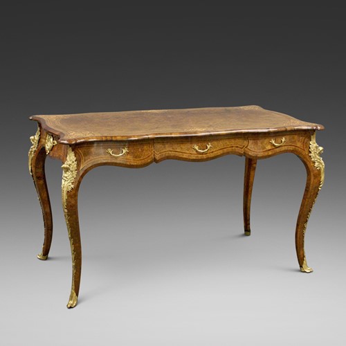 An English ormolu mounted bureau plat