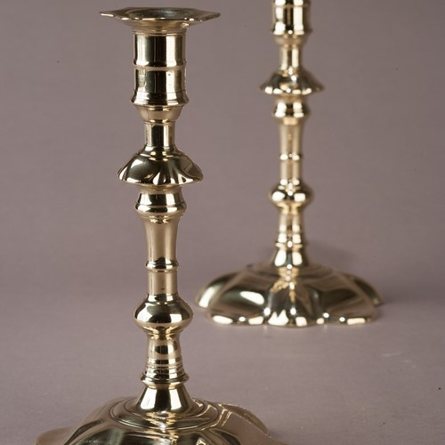 George II Seamed Brass Candlesticks.