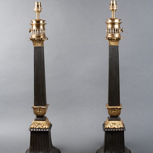 A Pair Of French Bronze & Ormolu Regulateur Table Lamps.