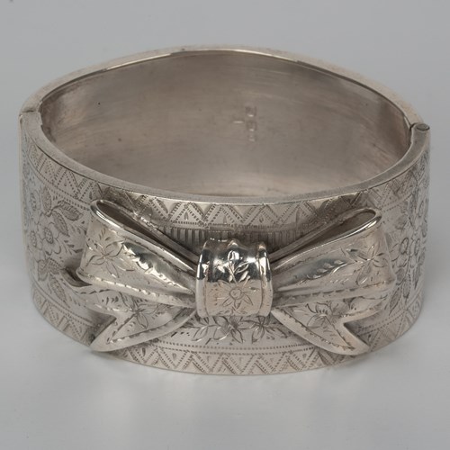 'West's Patent' Silver Bangle With A Bow