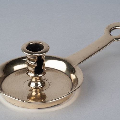 An Early Brass Chamberstick