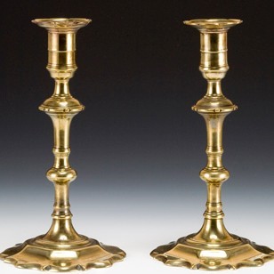 A Good Pair Of Georgian Ejector Brass Candlesticks