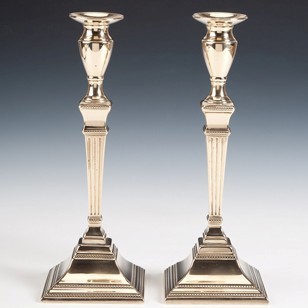 A Good Pair copper alloy Neoclassical Candlesticks